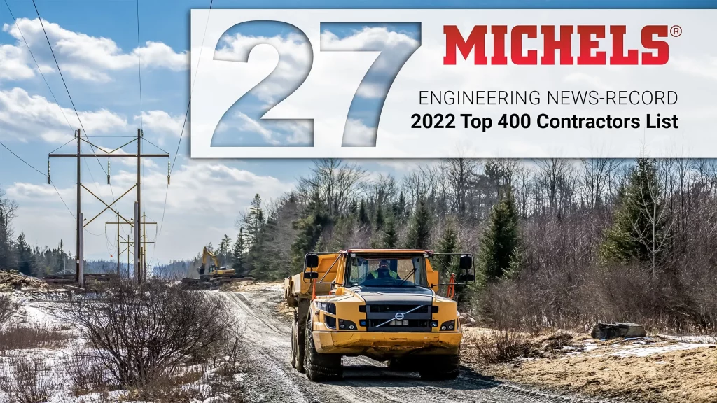Graphic showing heavy equipment travels down a gravel road with an overlay showing that Michels ranked 27th on the ENR