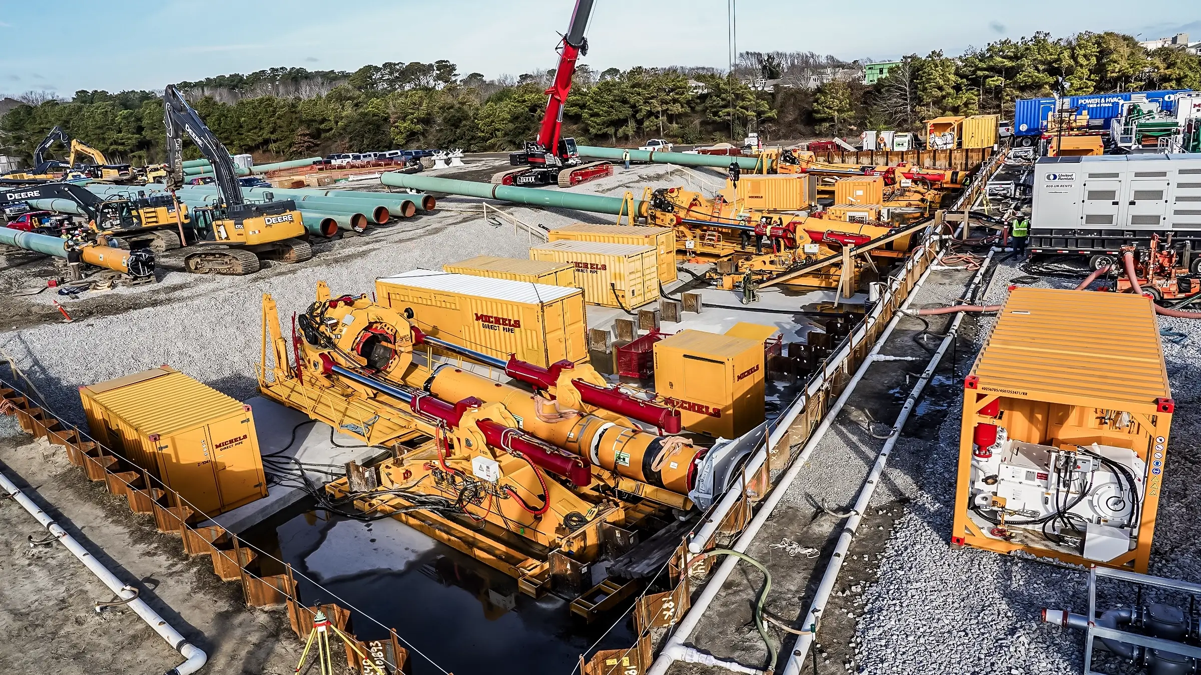 Several Direct Pipe machines operate on a jobsite.