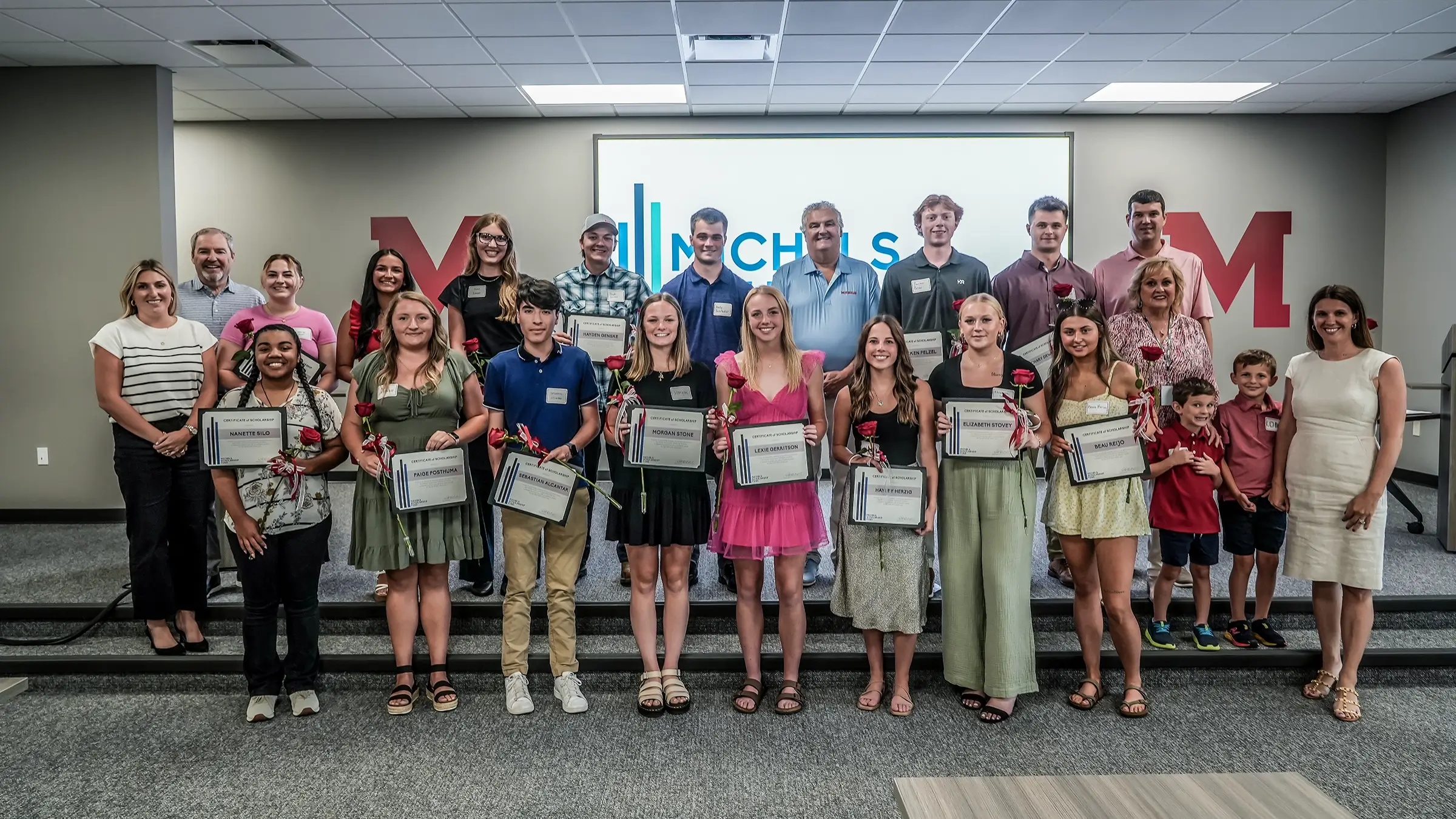 A group of scholarship winners standing together.