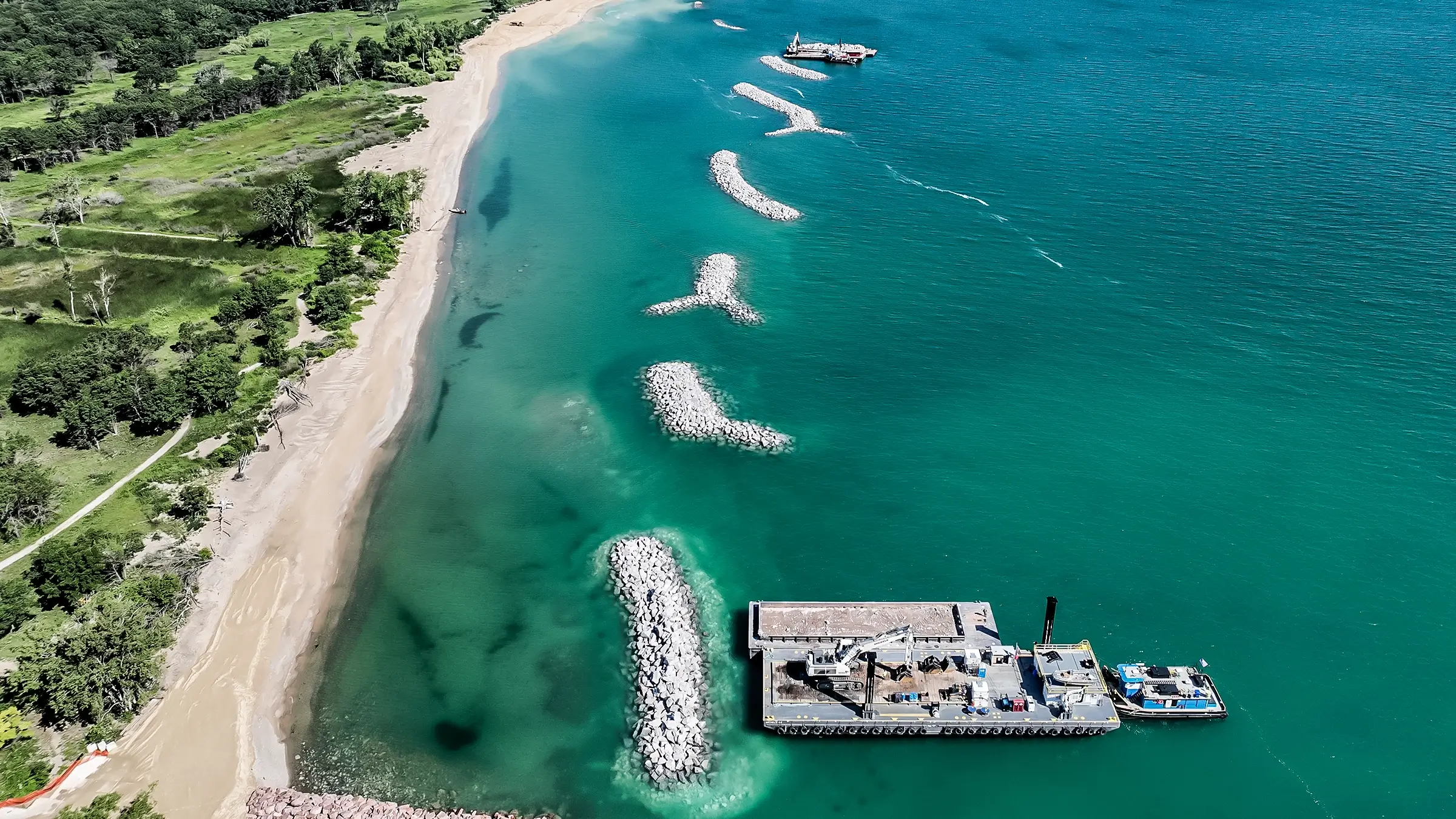 Rock piles long the shoreline of Illinois State Beach